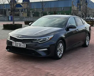 Vooraanzicht van een huurauto Kia Optima op de luchthaven van Yerevan, Armenië ✓ Auto #15858. ✓ Transmissie Automatisch TM ✓ 0 beoordelingen.