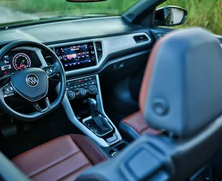 Volkswagen T-Roc Cabrio 2025 beschikbaar voor verhuur in Becici, met een kilometerlimiet van onbeperkt.