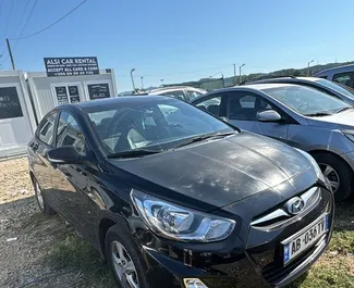 Vooraanzicht van een huurauto Hyundai Accent Blue in Durrës, Albanië ✓ Auto #16116. ✓ Transmissie Automatisch TM ✓ 0 beoordelingen.