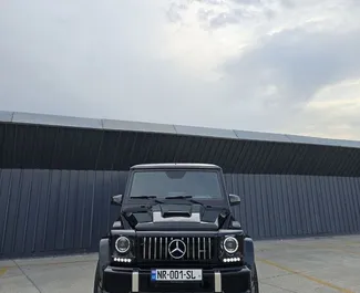 Vooraanzicht van een huurauto Mercedes-Benz G500 in Tbilisi, Georgië ✓ Auto #16145. ✓ Transmissie Automatisch TM ✓ 0 beoordelingen.