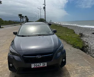 Vooraanzicht van een huurauto Subaru Crosstrek in Batumi, Georgië ✓ Auto #16159. ✓ Transmissie Automatisch TM ✓ 0 beoordelingen.