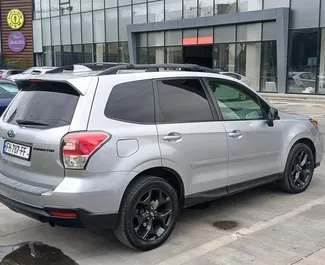 Vooraanzicht van een huurauto Subaru Forester in Tbilisi, Georgië ✓ Auto #16427. ✓ Transmissie Automatisch TM ✓ 0 beoordelingen.