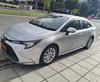 Autohuur Toyota Corolla Sedan 2024 in in Cyprus, met Hybride brandstof en 140 pk ➤ Vanaf 30 EUR per dag.