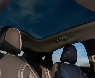 Verhuur Ford Mustang Mach E. Premium, Luxe, SUV Auto te huur in Georgië ✓ Borg van Borg van 560 GEL ✓ Verzekeringsmogelijkheden TPL, CDW, SCDW, FDW, Passagiers, Diefstal.