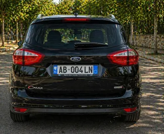 Vooraanzicht van een huurauto Ford C-Max op de luchthaven van Tirana, Albanië ✓ Auto #16309. ✓ Transmissie Automatisch TM ✓ 0 beoordelingen.