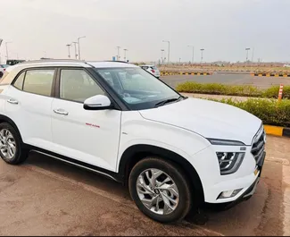 Vooraanzicht van een huurauto Hyundai Creta op de luchthaven van Goa, Goa ✓ Auto #16172. ✓ Transmissie Handmatig TM ✓ 0 beoordelingen.