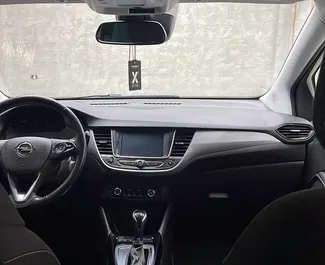 Opel Crossland 2021 beschikbaar voor verhuur op de luchthaven van Tirana, met een kilometerlimiet van onbeperkt.
