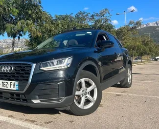 Vooraanzicht van een huurauto Audi Q2 op Podgorica Luchthaven, Montenegro ✓ Auto #16199. ✓ Transmissie Automatisch TM ✓ 0 beoordelingen.