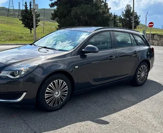 Vooraanzicht van een huurauto Opel Insignia Combi in Tbilisi, Georgië ✓ Auto #16568. ✓ Transmissie Automatisch TM ✓ 0 beoordelingen.