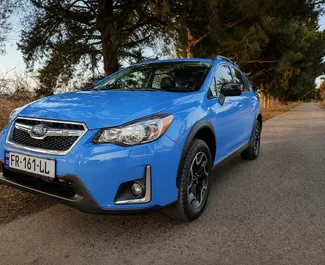 Vooraanzicht van een huurauto Subaru Crosstrek in Tbilisi, Georgië ✓ Auto #16572. ✓ Transmissie Automatisch TM ✓ 0 beoordelingen.