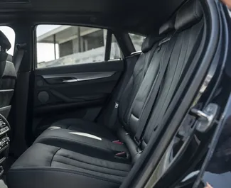 BMW X6 2021 beschikbaar voor verhuur in Tbilisi, met een kilometerlimiet van 200 km/dag.