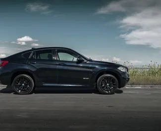 Autohuur BMW X6 2021 in in Georgië, met Benzine brandstof en 306 pk ➤ Vanaf 230 GEL per dag.