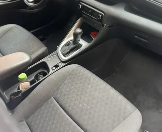 Autohuur Toyota Yaris 2024 in in Montenegro, met Hybride brandstof en 115 pk ➤ Vanaf 35 EUR per dag.