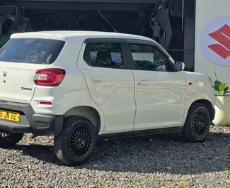 Vooraanzicht van een huurauto Suzuki S-Presso in Mauritius, Mauritius ✓ Auto #16527. ✓ Transmissie Automatisch TM ✓ 0 beoordelingen.