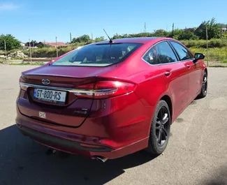 Interieur van Ford Fusion Sedan te huur in Georgië. Een geweldige auto met 5 zitplaatsen en een Automatisch transmissie.