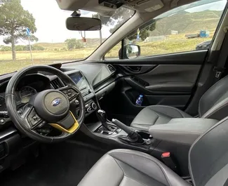 Subaru Crosstrek 2023 beschikbaar voor verhuur in Tbilisi, met een kilometerlimiet van 250 km/dag.