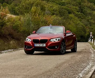 Vooraanzicht van een huurauto BMW 230xi Cabrio in Tbilisi, Georgië ✓ Auto #12308. ✓ Transmissie Automatisch TM ✓ 0 beoordelingen.