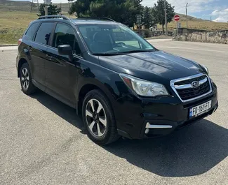 Vooraanzicht van een huurauto Subaru Forester in Tbilisi, Georgië ✓ Auto #16570. ✓ Transmissie Automatisch TM ✓ 0 beoordelingen.