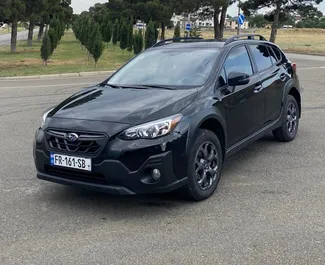 Vooraanzicht van een huurauto Subaru Crosstrek in Tbilisi, Georgië ✓ Auto #12309. ✓ Transmissie Automatisch TM ✓ 0 beoordelingen.